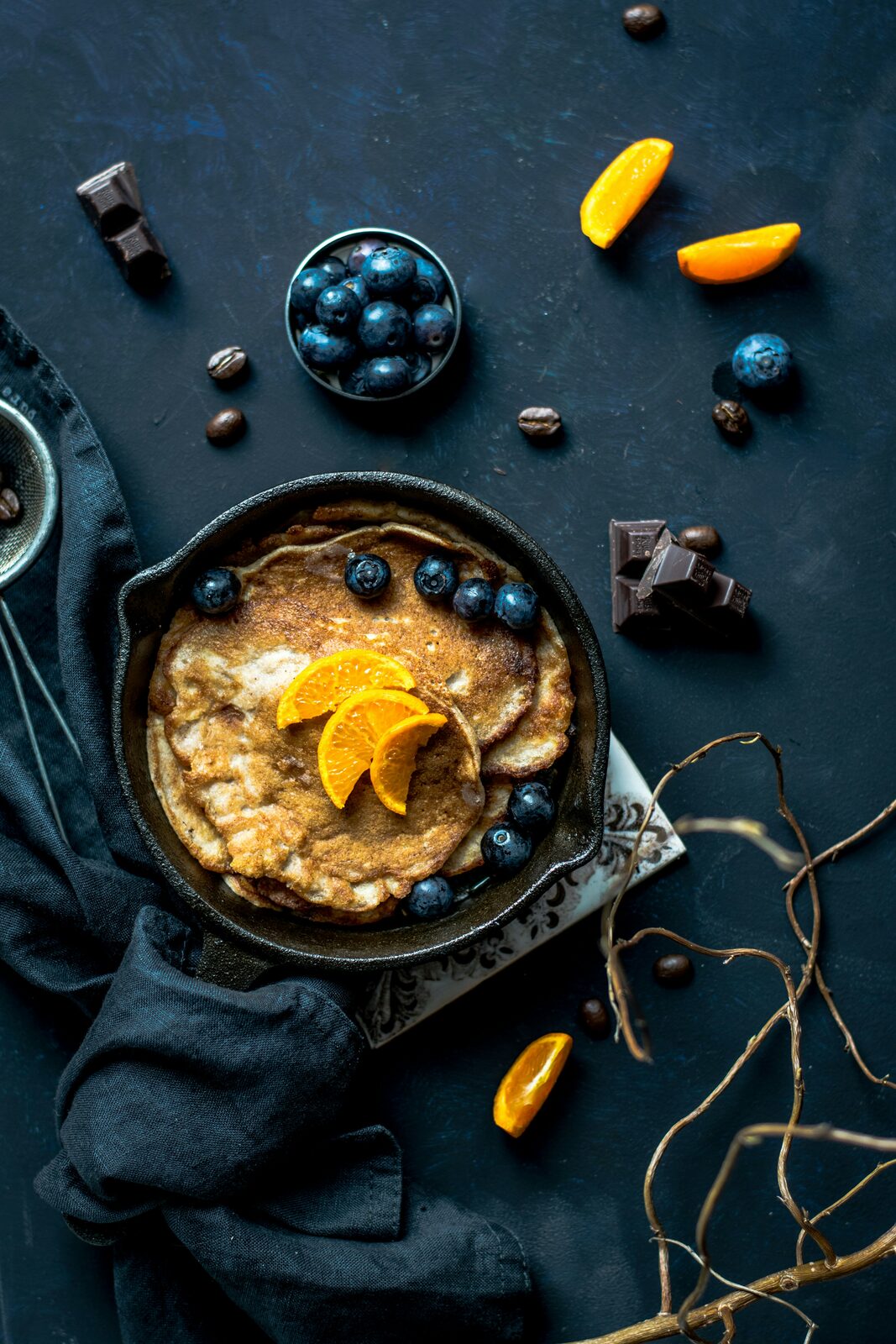 Skillet pancakes with blueberries and orange