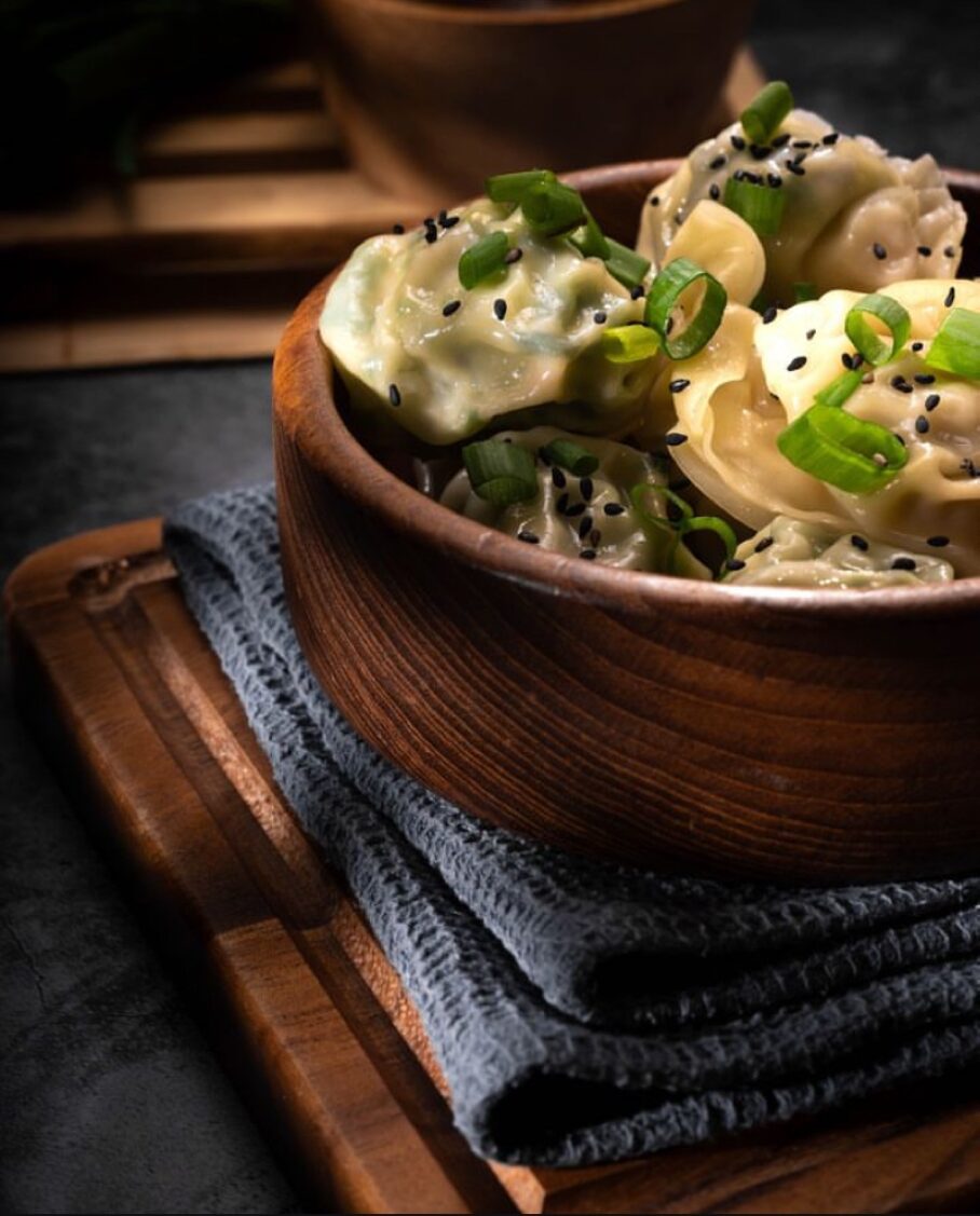 Close view of dumplings with scallion and sesame