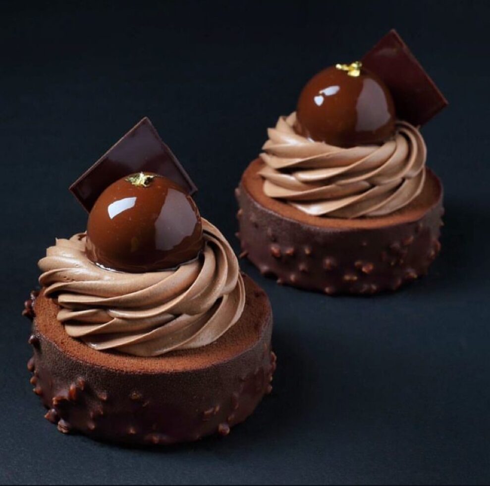 Chocolate mousse tarts with gold leaf